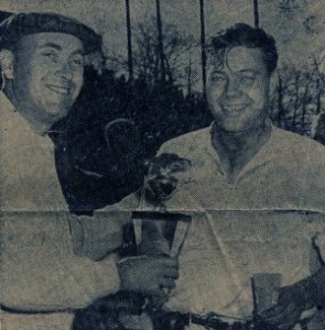 Lakewood co-promoter Ernie Trautman presents Johnny Beauchamp with the trophy for his 1959 NASCAR win at Lakewood.
