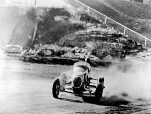 Lakewood was a track where many came to push their cars to the edge. Here, a driver pushes his car off into turn one during what appears to be a practice session (note the empty stands). Unfortunately, many pushed their luck too far during the track's early days, and paid the ultimate price.