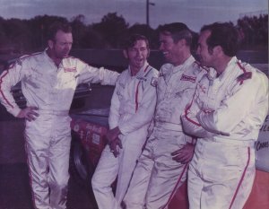 Red Farmer, Donnie Allison, Bob Burcham and Freddy Fryar have a friendly chat before a race at Montgomery International Spedway around 1970.