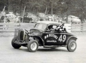 Bud Lundsford takes a victory lap after a 1956 win at Banks County.  Photo courtesy GARHOFA