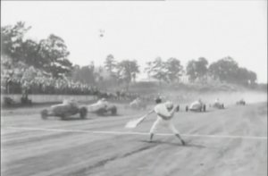 The green flag flies on the newsreel of the Labor Day, 1946 event at Lakewood Speedway.  