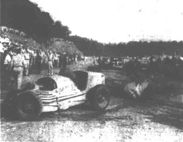 This rare Acme Telephoto wire photo shows the Robson-Barringer accident from a unique perspective that shows the accident unfolded before the cars reached the third turn of the track.