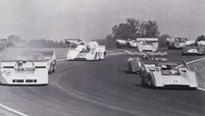 Vic Elford (66) and Denny Hulme (5) pace the first lap at Road Atlanta during the Can Am event in Sept. of 1970.