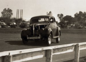 Jack Smith slides through the turn at Macon in the '40s.