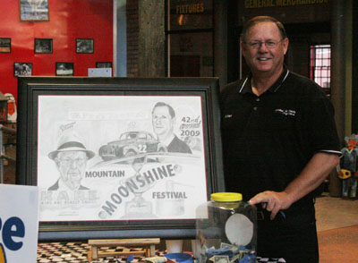 Artist Michael W. Smith unveiled this beautiful picture honoring Raymond Parks and the Moonshine Festival Friday night.  The original was raffled off to raise money for K.A.R.E. For Kids.  For more information on Michael and his work, go here.