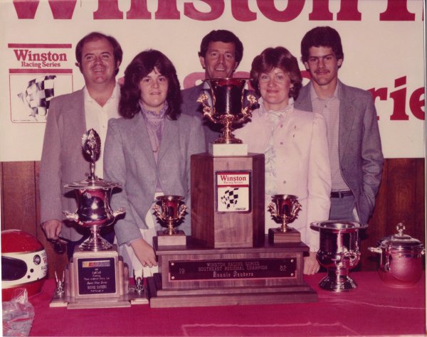 Sanders and his trophy for winning the 1982 Winston Southeastern championship.