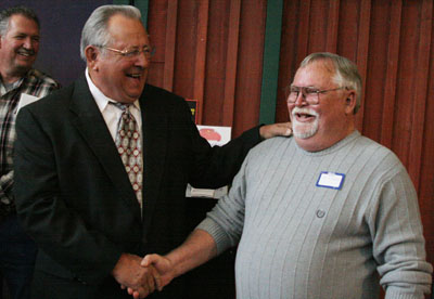 2009 inductees Leon Sells (left) and Buck Simmons (right) share a laugh before the ceremony.