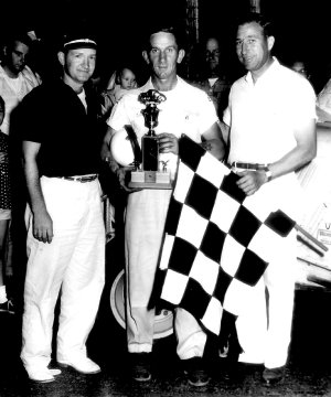 Jimmy, Eddie MacDonald and flagman Earl Coleman after Eddie wins another of many victories (probably at Columbus Speedway).